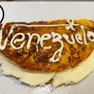 cachapa de  queso de mano y mantequilla