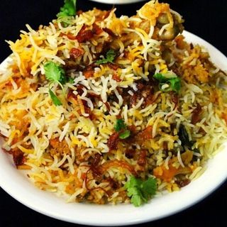 Half Chicken Dum Biryani (300grm) with Raita (DUM = Charcoal Smoked) yummy