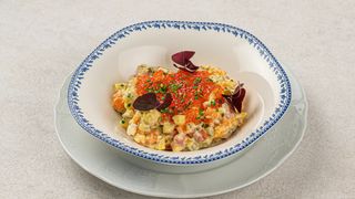 Оливье с колбасой и икрой