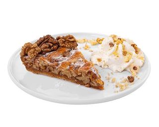 Tarta orzechowa z bitą śmietaną, prażonymi orzechami i kruszonką 140 g