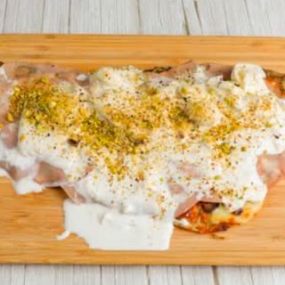 Milanesa de pollo mortadella y burrata 