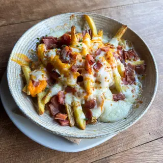 Patatas Fritas con queso y bacon