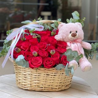 basket of roses and teddy bear