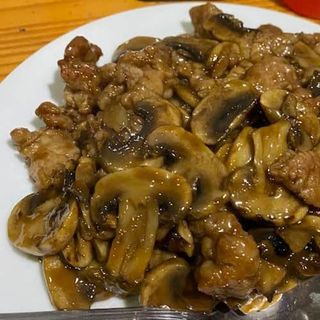 Ternera con champiñones