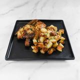 Mezzo Pollo marinato alla diavola e patate al forno