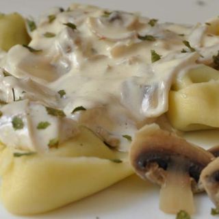 Tortellini con champiñones y foie con parmesano 
