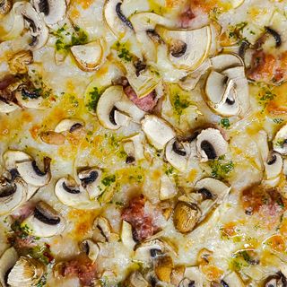 Funghi e salsiccia teglia intera