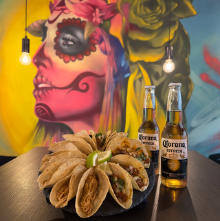 12 Tacos  y 2 Bebidas Especial