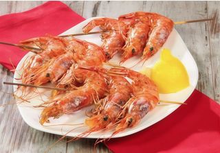 Spiedini di gamberoni sale e pepe