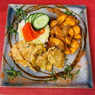 Șnițel de soia, cartofi wedges și salată de varză - 530 gr