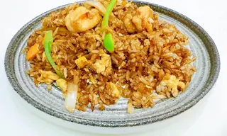 Arroz frito con pato y verdura