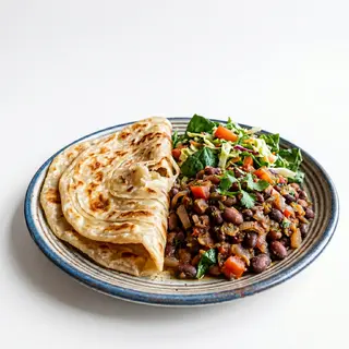 Kikomando 2 Chapatis + Panfried Beans + Vegetable Salad