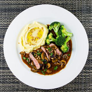 Свински карета със сос от манатарки