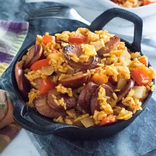 With Suya rice, Sausage & Turkey.