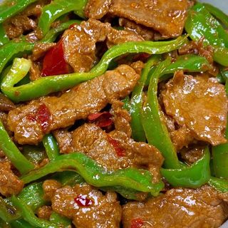 91 Ternera con pimiento verte