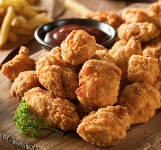 Bocados de pollo crujientes (ración)