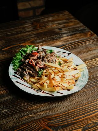 Телятина с грибами под сливочным соусом (630г)