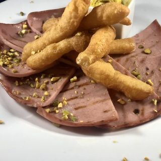 SPICCHI DI MORTADELLA SCOTTATA
