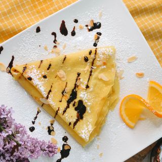 Crepe with chocolate and oranges peel