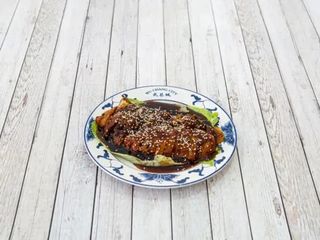 415. Pato Laminado Con Salsa Teriyaki