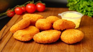 Наггетсы 8шт + соус (200г)