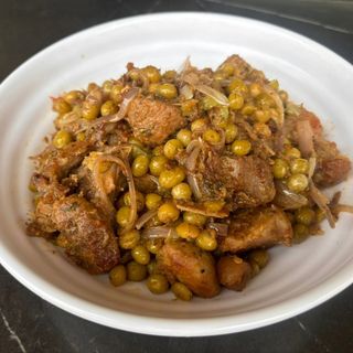 Viande De Porc Aux Petits Pois