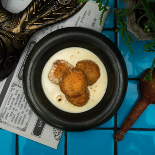 Pumpkin balls with Guda cheese and nuts