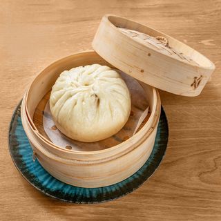 Bao - zi ripieno di maiale al vapore-un pezzo