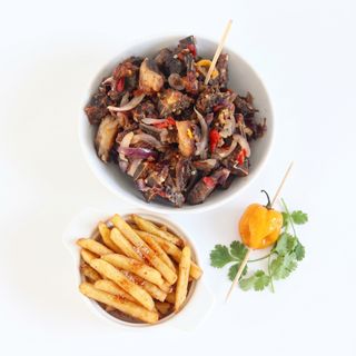Grilled Peppered Asun Goat Meat & Fries