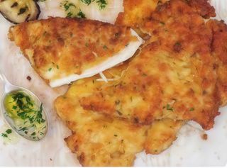 Cotoletta De Pollo con patatas fritas