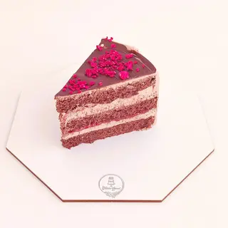 Tarta de chocolate, mermelada y frambuesa (Porción)