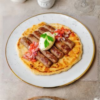 Ćevapi na kajmaku 300 gr