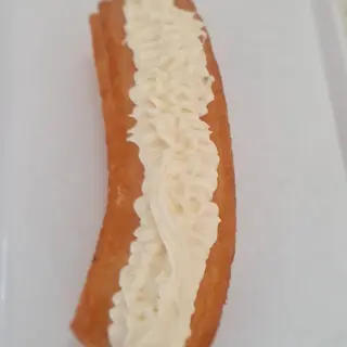CHURRO RELLENO DE CHOCOLATE BLANCO .