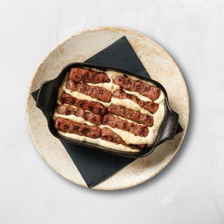 Zapečeni ćevapi u kajmaku