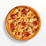 Пицца Мясной удар