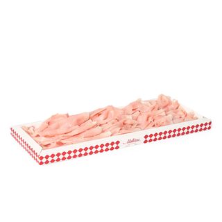 Caja Jamón cocido cortado muy fino. Acompañada de picos camperos