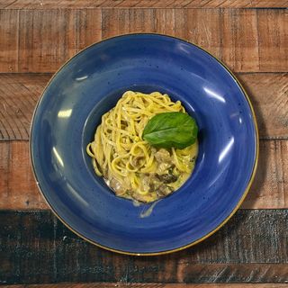 Tagliolini con mix di funghi e profumo di tartufo