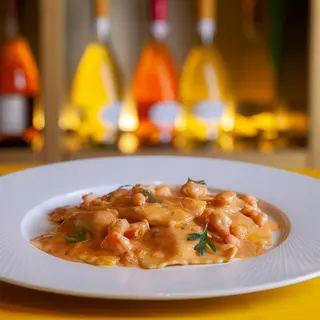 Ravioli Bogavante con salsa Bisque de Marisco