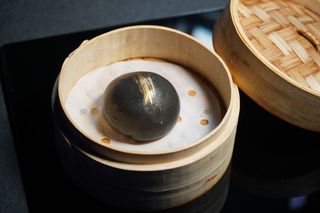 31. Black char siu bao