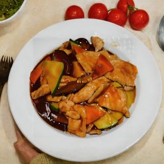 Maiale con verdure miste