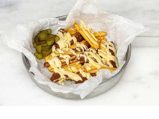 Хрумка курка з картоплею під сирним соусом (330g)