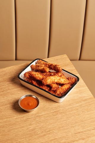 Fingers de pollo rebozado