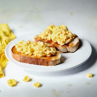 Scrambled Eggs on Toast + tea/Juice