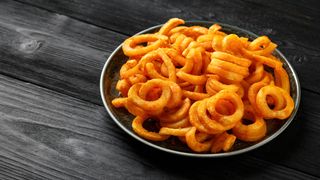 Cartofi curly condimentati 300g