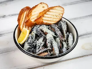 Мідії Чорноморські в сирному соусі з Дор Блю (500g)