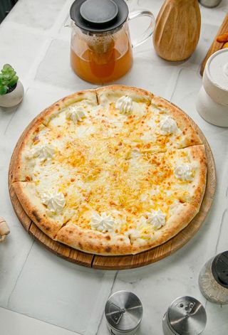 Пицца "Четыре сыра" (610г)