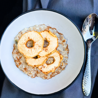 Whole grain oatmeal with baked apple with cinnamon