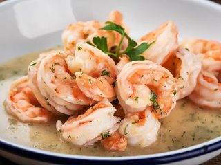 Хвости тигрових креветок в часниковому соусі (200g)