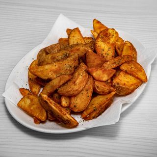 Patate fritte rustiche aromatizzate
