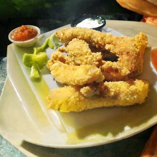 Панирани пилешки пръчици корни (250г)